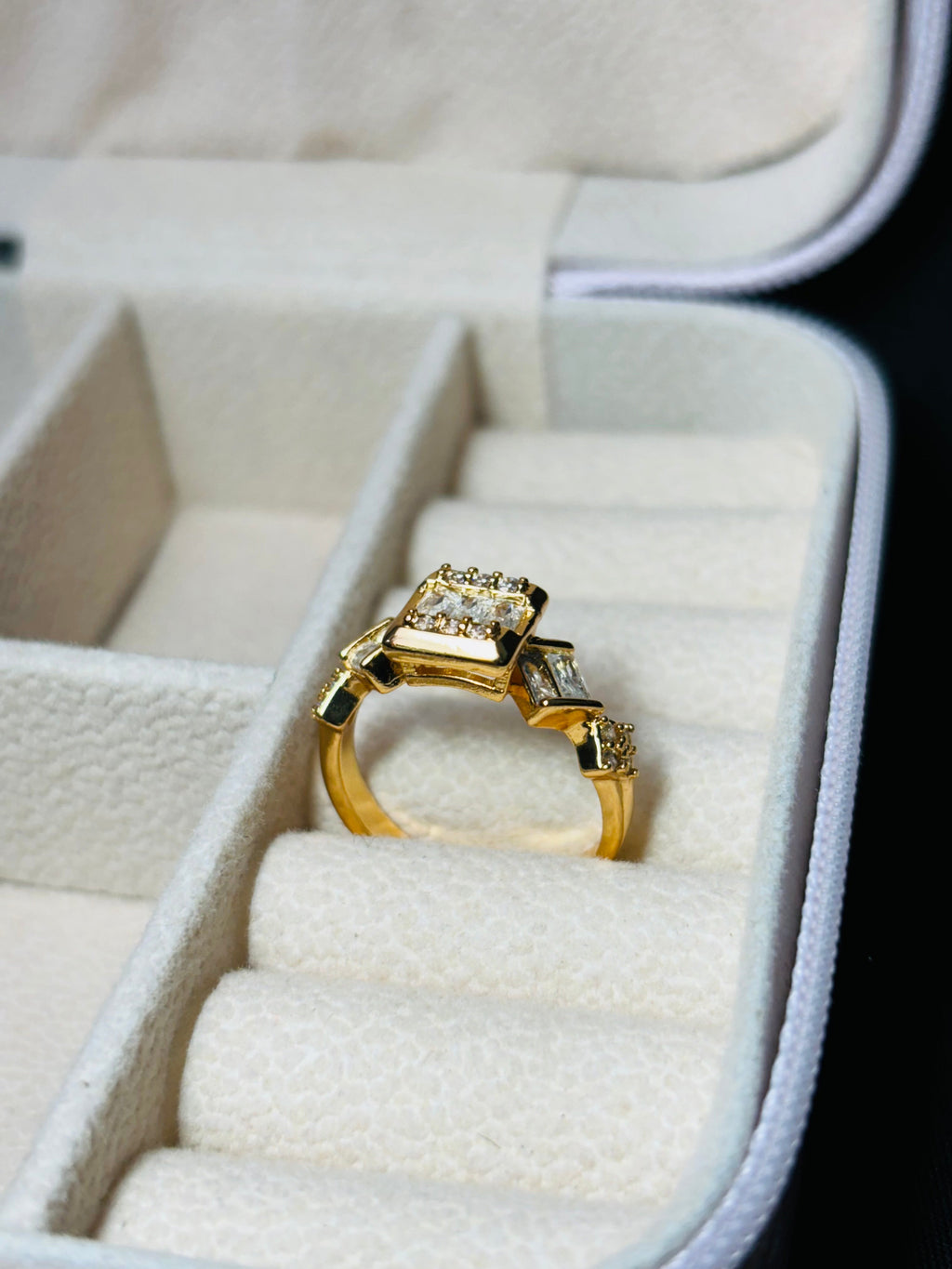 Gold colour square and oval shaped ring