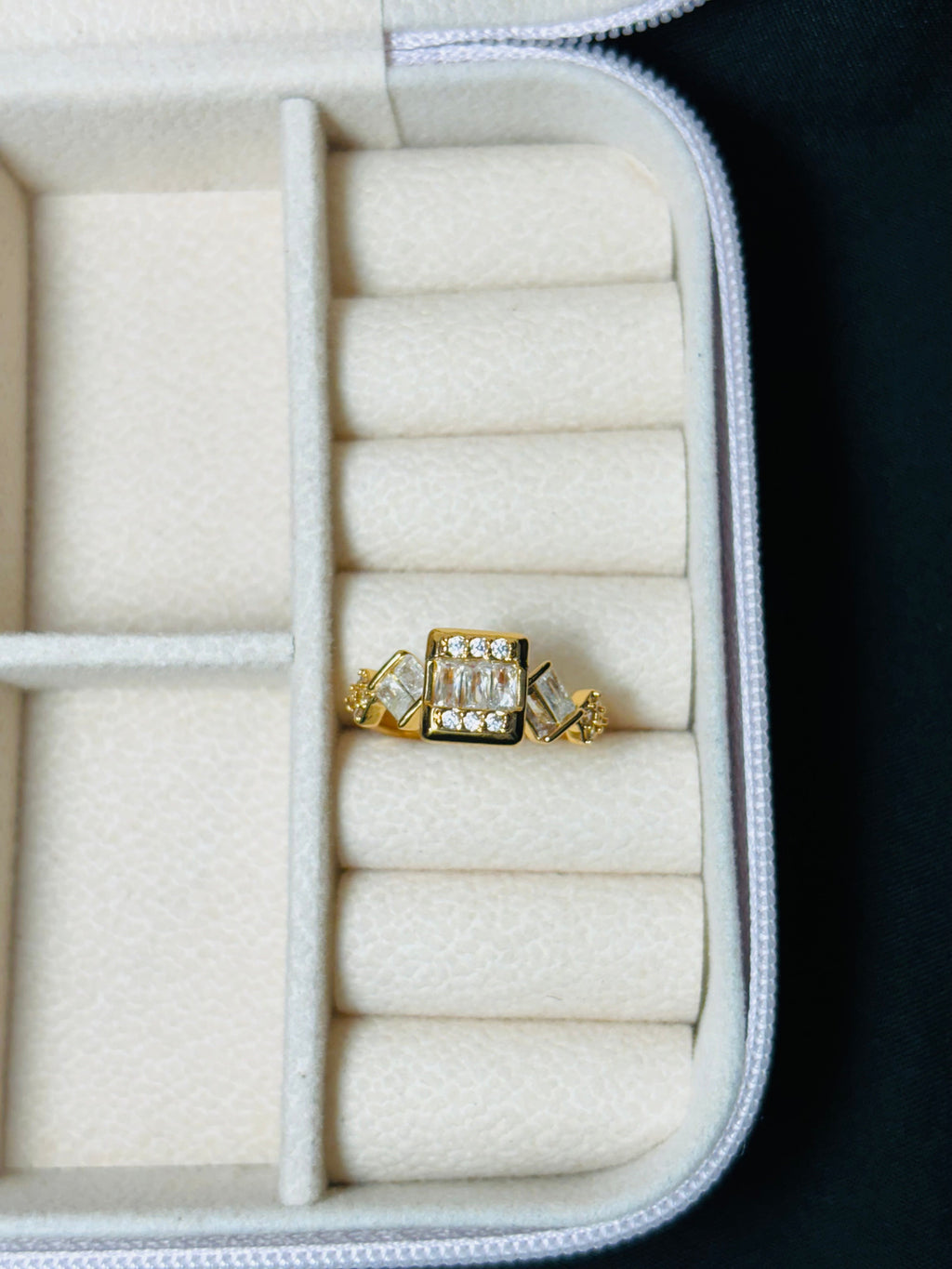 Gold colour square and oval shaped ring