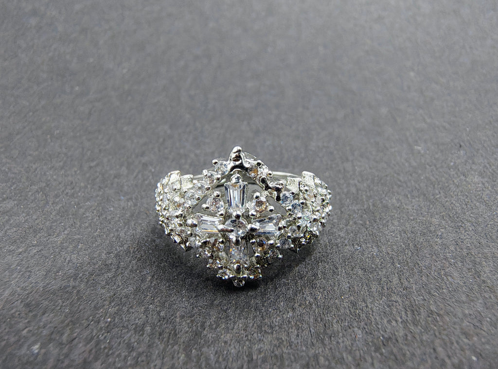 Silver snowflake ring with white stones