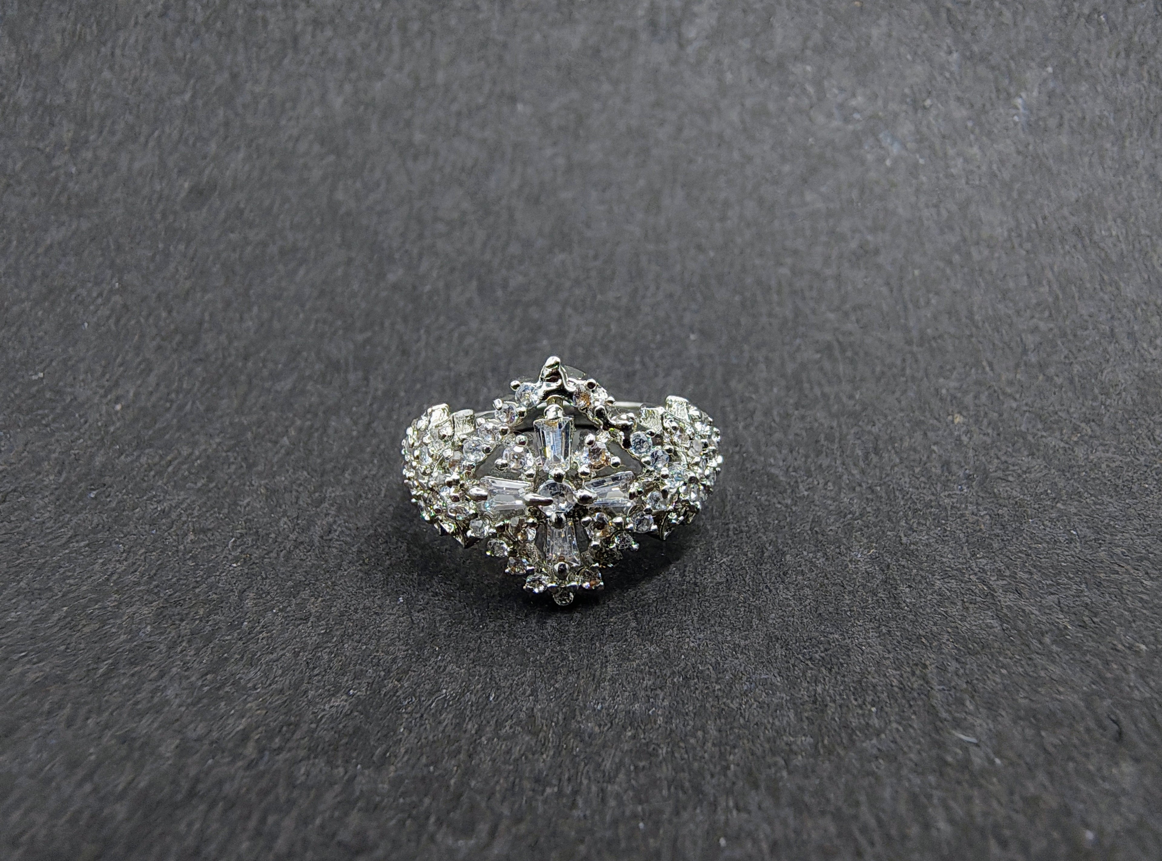 Silver snowflake ring with white stones