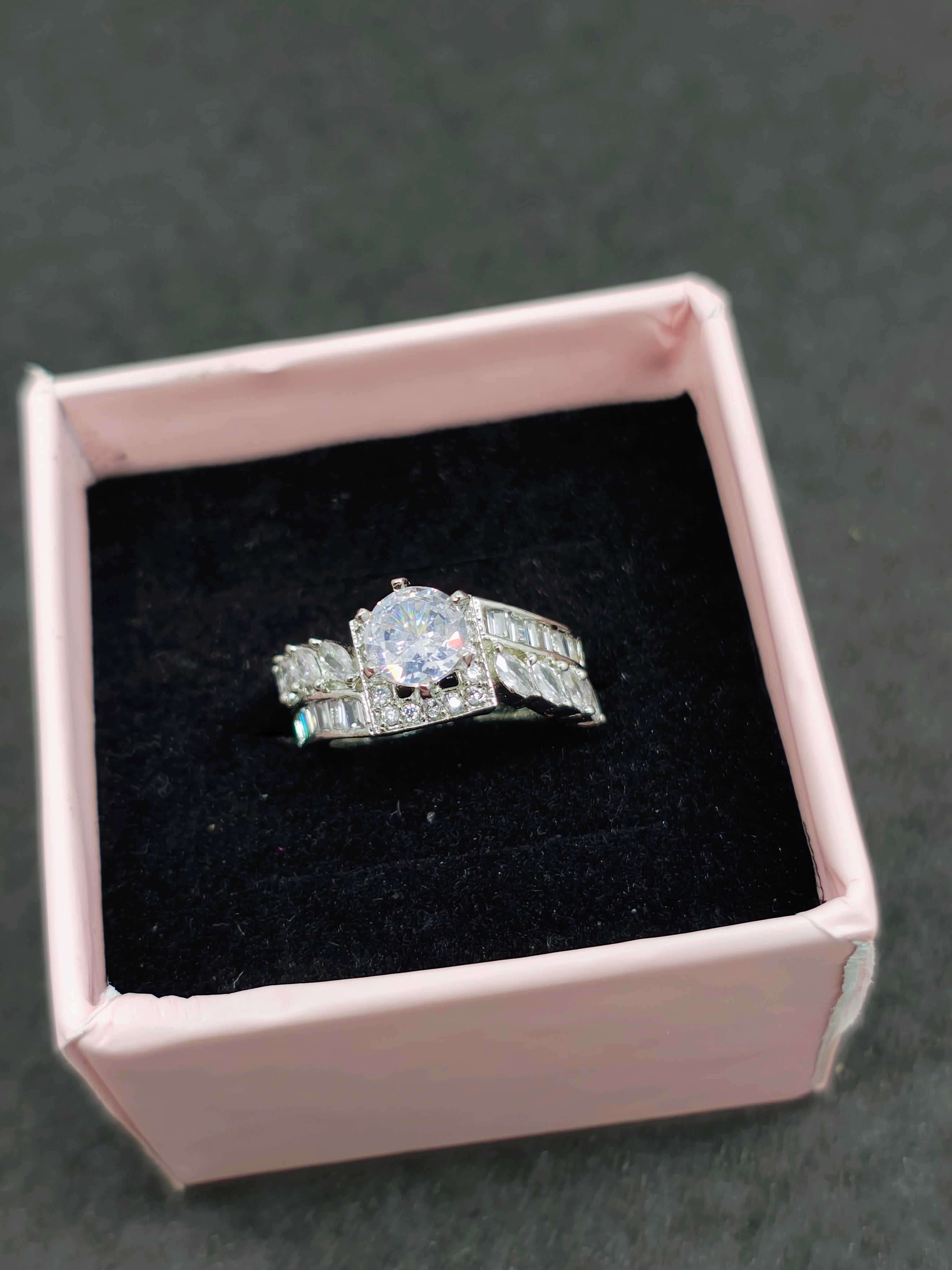 Silver and white Oval- Cut stone ring