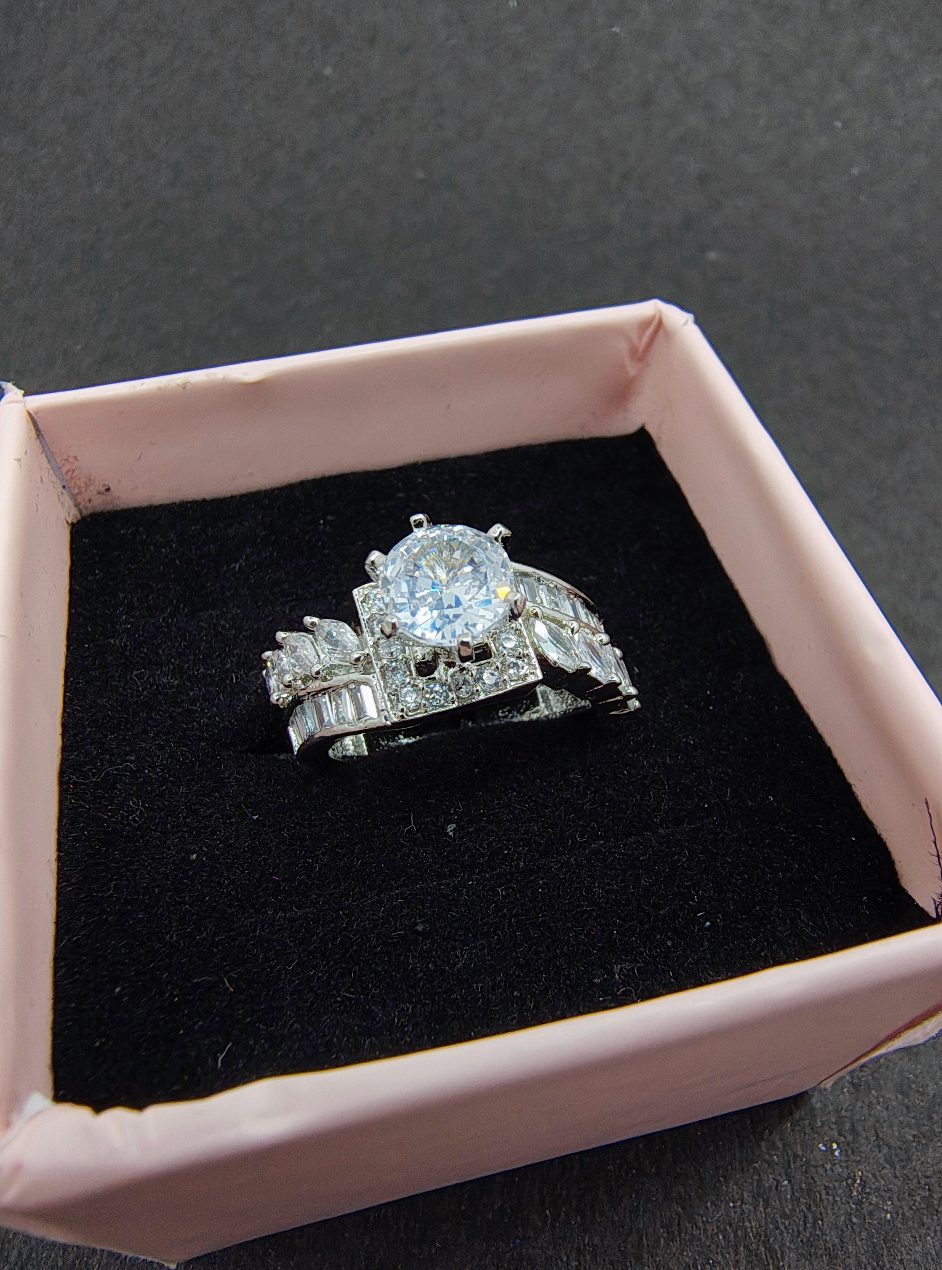 Silver and white Oval- Cut stone ring